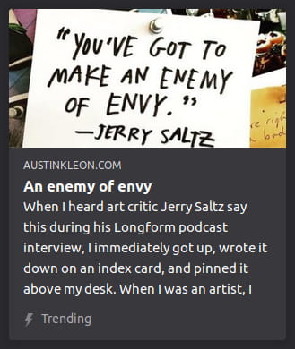 By Austin K. Leon. Photo o’ a white card with “You’ve got to make an enemy of envy. – Jerry Saltz” written on it in marker tacked o’er photos.